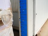 a blue door in the middle of a room