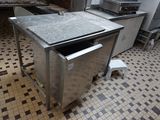 an image of a kitchen with a sink and a stove