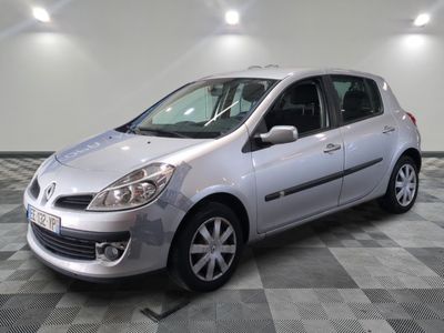 a picture of a silver car parked on a checkered floor