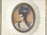 a picture of a woman with a tiara in a picture frame