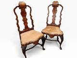 pair of antique carved walnut chairs with upholstered seats