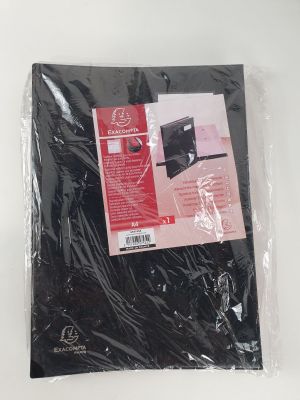a bag of black plastic material on a white surface
