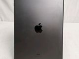 an apple ipad is sitting on top of a white table
