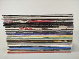 a lot of magazines stacked on top of each other