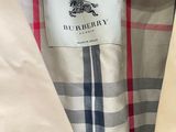 a close up of a white shirt with a checkered pattern on it