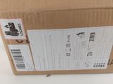 a box that is sitting on a table with a sticker on it