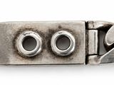 a close up of a silver bracelet on a white background