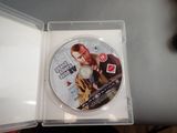 a dvd in the case with a picture of a man on it
