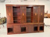 an image of a large wooden entertainment center in a room