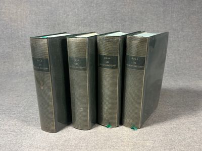 three books sitting on top of each other on a table