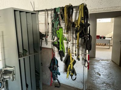 a room that has a bunch of items hanging on the wall