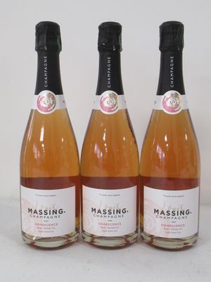 three bottles of wine sitting on top of a table next to each other