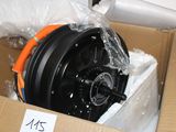 a box with a black wheel inside of it