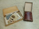 a small box with a book inside of it on a table