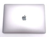 a white apple laptop with an apple logo on it