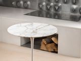 a marble table in the middle of a room