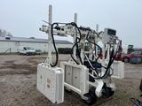 a machine that is sitting on the ground in the dirt