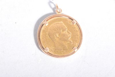 a gold coin with a picture of a man on it