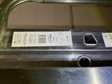 a close up of a metal object with a label on it
