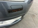 a close up of a car with a sticker on it