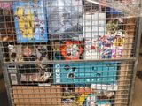 a metal cart with many items in it in a warehouse