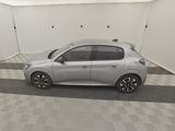 a picture of a silver car in a garage