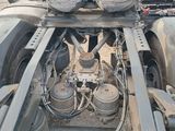 an image of a truck with a large engine in the back of it