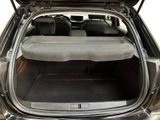 a trunk of a car with the back seats folded down
