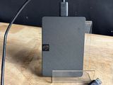 an external hard drive with a usb cable connected to it