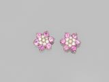 a pair of pink sapphire and diamond earrings