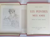 un livre ouvert posé sur une table, à côté du dessin représentant un homme
