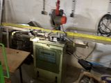 an image of a room with a stove and a work bench