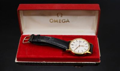 an image of a watch in a red box on a black surface