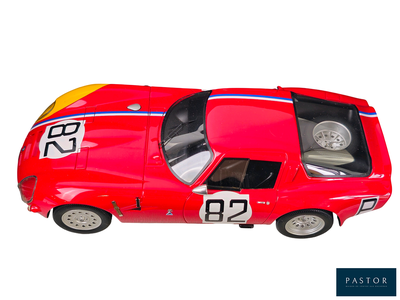 a red toy car with a number on it
