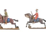 deux figurines représentant un homme à cheval et un homme à cheval