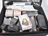 a black suitcase filled with electronic gadgets and other items