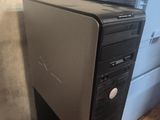 a computer tower with a hard drive on top of it