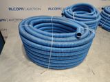 several blue hoses sitting on top of a table next to each other