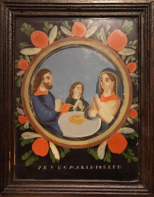 une image représentant un tableau où l'on voit une famille assise à table