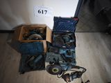 a box of tools sitting on the floor next to a box of tools