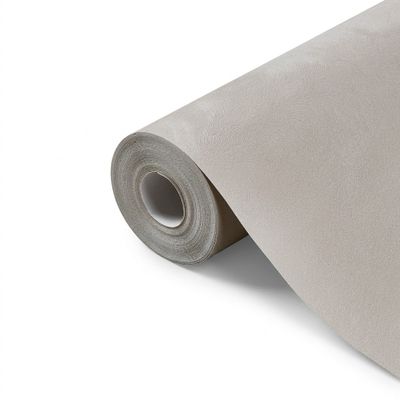 a close up of a roll of paper on a white surface