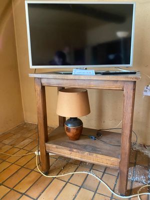 a television that is sitting on a stand in a room