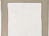 a close up of a piece of cloth on a white surface