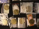 a lot of coins in the bags on the table