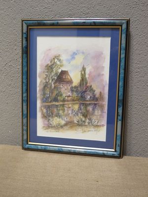 a picture of a picture of a house on the wall