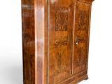 an image of a wooden armoire with carvings on it