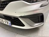 a close up of the front bumper of a white car