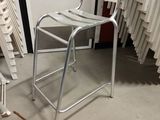 a chair that is sitting in the middle of a room