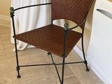 a chair that is next to a radiator in a room
