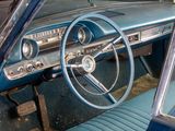 a blue car with a steering wheel and dashboard